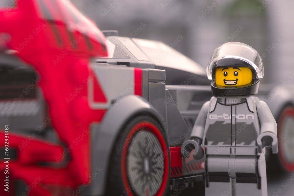 Obraz premium Tambov, Russian Federation - June 24, 2024 Lego Audi S1 E-tron Quattro car driver near the back of his car. LEGO Speed Champions. Close-up