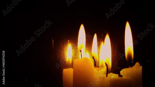 burning candle in the dark