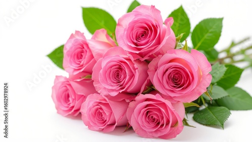 Stunning bouquet of vibrant pink roses with lush green leaves, perfect for expressing love and appreciation