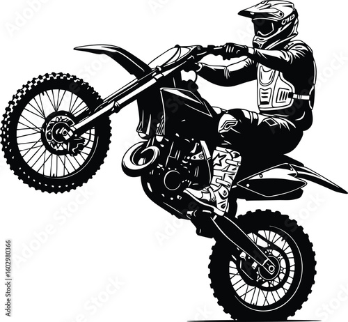 Silhouette of motocross rider performing a wheelie on dirt bike for graphic design