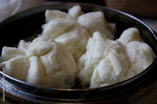 Traditional Chinese Steamed Buns (Char Siu Bao) in Bamboo Steamer – Dim Sum Classic