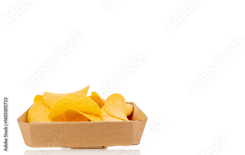 Crispy potato chips isolated on white background, close-up.