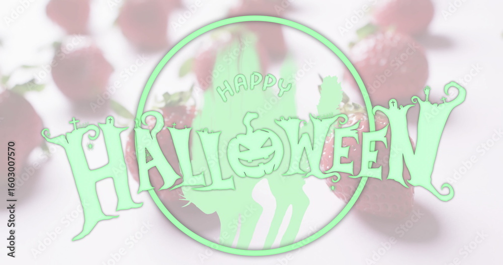 Fototapeta premium Featuring Halloween graphic with jack-o'-lantern and cat silhouettes in studio, with strawberries