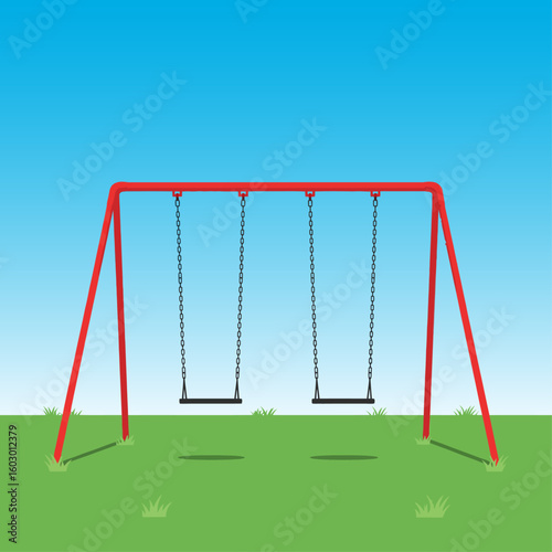 A red swing set with two swings hanging from chains in a green field under a clear blue sky day time