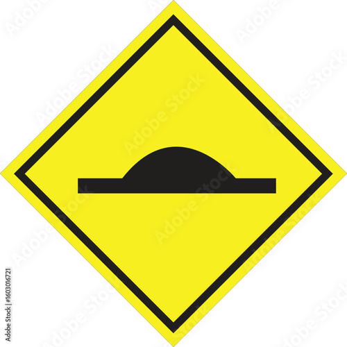 Yellow diamond warning sign indicating a speed bump ahead on the road