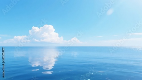 Calm Ocean Horizon with Reflective Clouds Under a Clear Sky