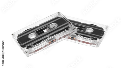 Audio cassettes with magnetic tapes isolated on white