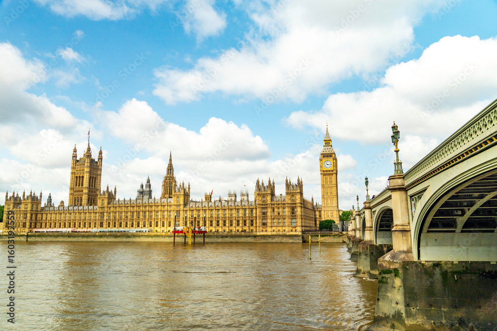 Fototapeta premium Big Ben tower of Houses of Parliament and Westminster pier, London, UK