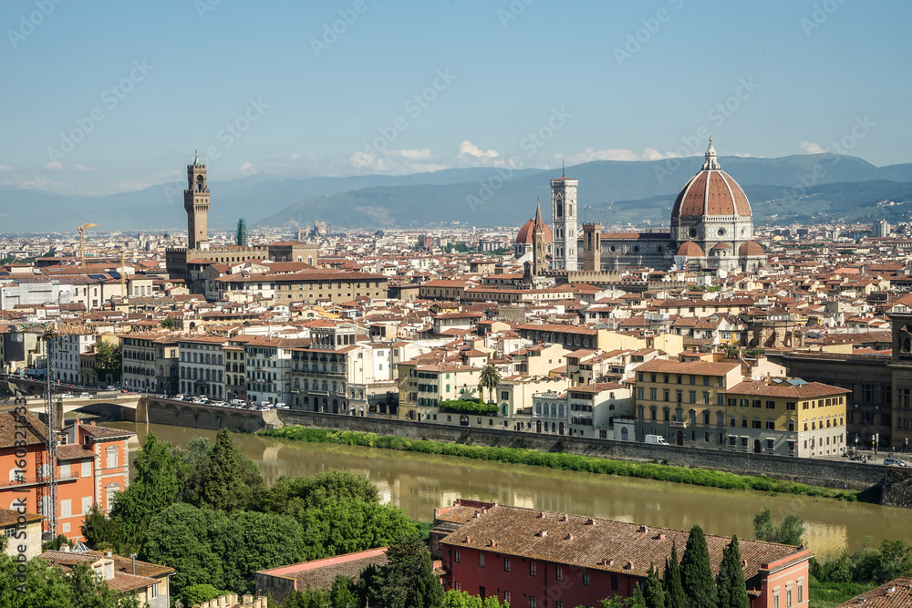 Naklejka premium A Florence Firenze city in Italy Toscana view with a river running through it