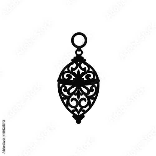 Ornate oval pendant with decorative filigree charm
