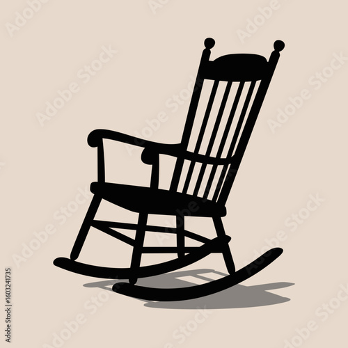 Black rocking chair on beige background for International Day of the Elderly  