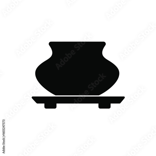 Black pottery vessel on stand silhouette icon