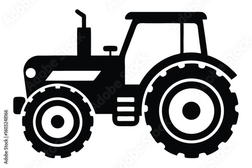 Black Silhouette of a Farm Tractor with Large Wheels and Cab Design