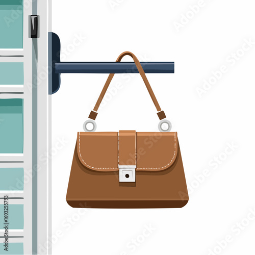 Handbag on hook – Leather handbag hanging neatly near the entrance.
