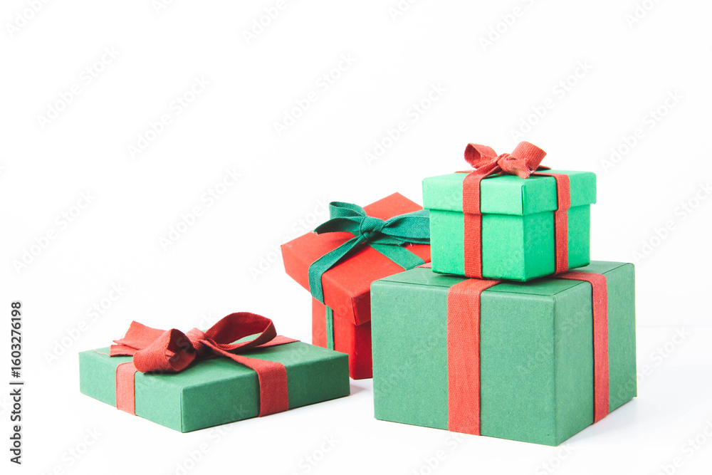Obraz premium Present. Gift box with a bow. New Year's surprise. Red and green box with a gift