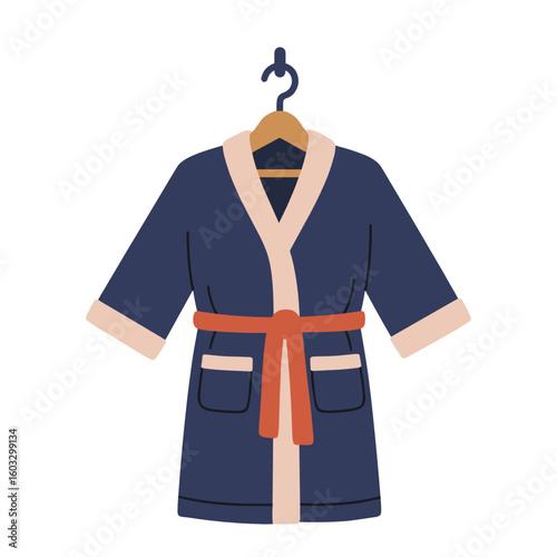 Bathrobe hanging from a hook with a wooden hanger  