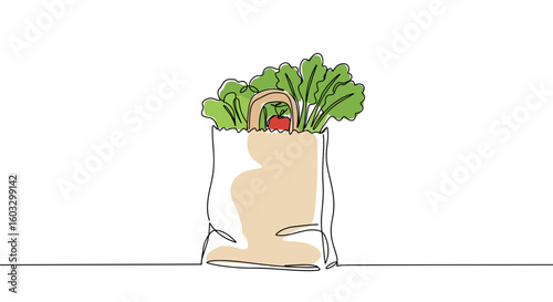 Grocery bag filled with fresh greens and tomatoes on white background  