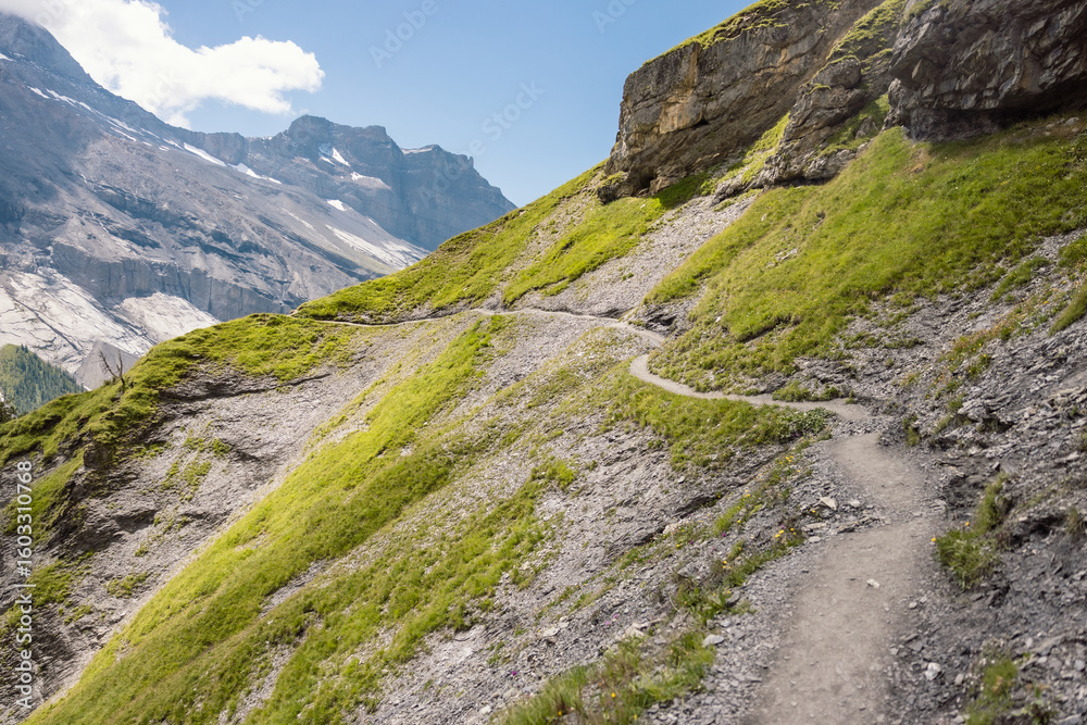Fototapeta premium Lake Oeschinen in Switzerland, beautiful swiss mountain lake and famous hike on Instagram