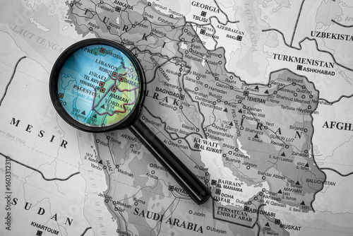 Tel Aviv, vibrant coastal city in Israel, seen through a magnifying glass highlighting its culture, beaches, and modern skyline with black and white background