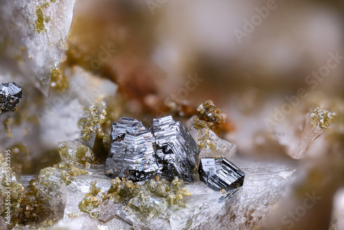 Rutile with green Clinochlore on Adularia. Specimen from Große Fleiß valley, Austria. Micro photography extreme close-up. microscope mineral crystal photography for Scientific use.
