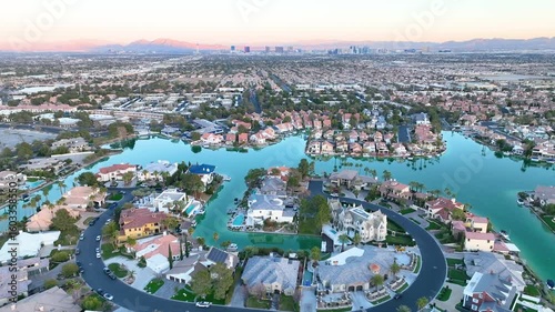 Aerial Fly Through of Las Vegas Suburb with Lake and Strip Skyline