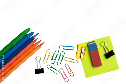 Colorful school supplies including pencils paperclips sharpener and eraser arranged at the bottom with copy space on white, png isolated. 