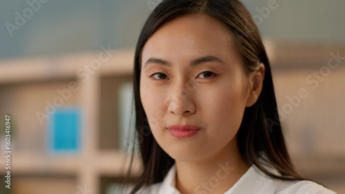 Free Download Confident successful Asian Korean business woman female worker girl entrepreneur boss Chinese Japanese businesswoman manager CEO work employer close up turning head looking camera indoors office room - GFXLoad