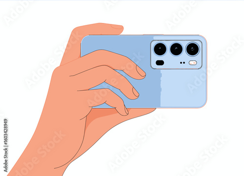A hand holds a modern smartphone, with a focus on the camera, indicating the act of capturing memories or moments in the digital age of communication and technology.