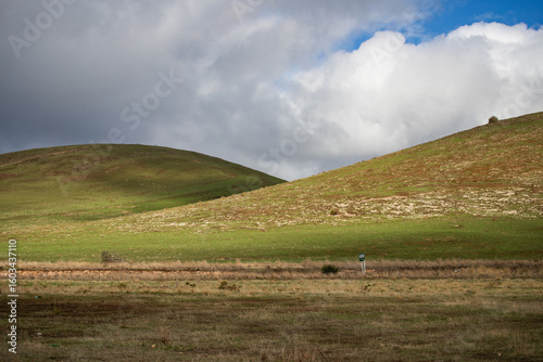 landscape with mountains and clouds