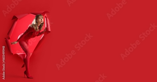 Stylish woman with torn red...