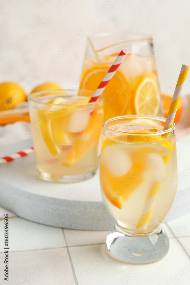 Fototapeta premium Glasses of infused water with lemon on table