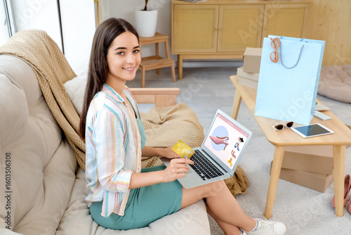 Young woman with credit car...