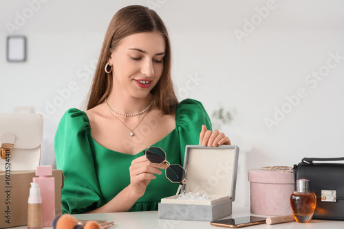 Happy young fashion blogger...