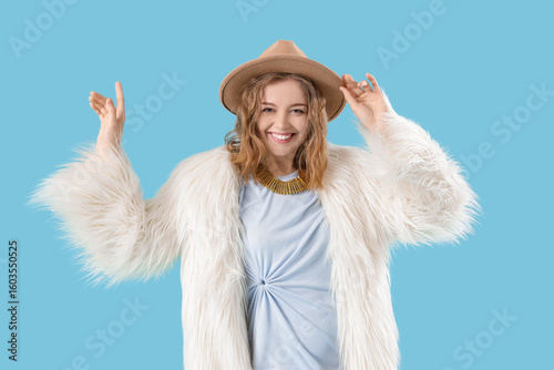 Fashionable young woman dan...
