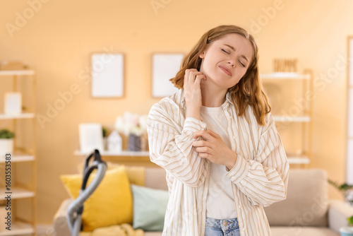 Young woman scratching hers...