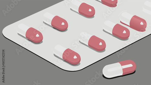Pink and White Capsules in Blister Pack One Capsule Separated.