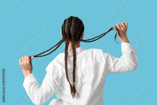 Young woman in white shirt ...