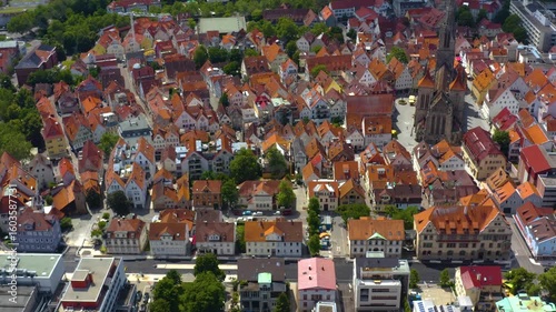 Aerial view around the old town of the city Reutlingen in Germany on a sunny summer afternoon	