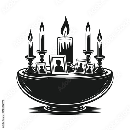Memorial display with burning candles and framed portraits remembrance tribute