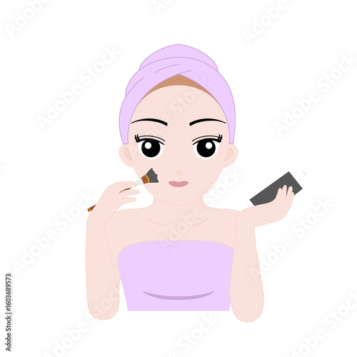 Woman Applying Charcoal Face Mask with Brush and Purple Towel and Blonde Hair