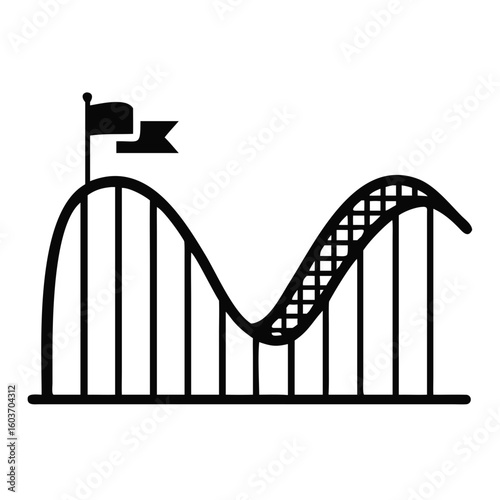 Silhouette of a Rollercoaster Curve With a Flag at an Amusement Park