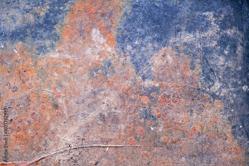 Wallpaper Mural Close-up of a corroded metal surface with orange rust patterns and blue paint remnants. Torontodigital.ca