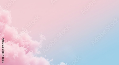 Ethereal background featuring a clear pastel blue sky blending into soft pink cloud banks.

