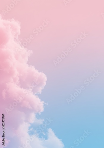 A beautiful sky featuring fluffy, cotton-candy-like clouds in a gentle pastel pink and blue blend.

