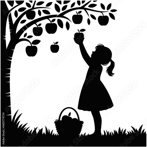Silhouette of girl picking apples from tree