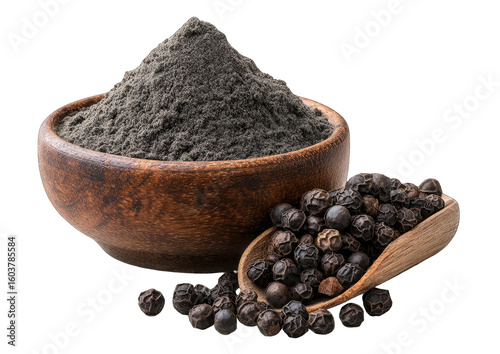 Ground black pepper in wooden bowl with whole peppercorns