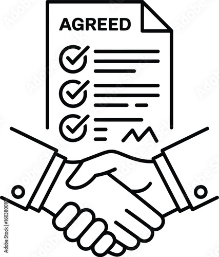 Successful business agreement finalized with a handshake and signed document.