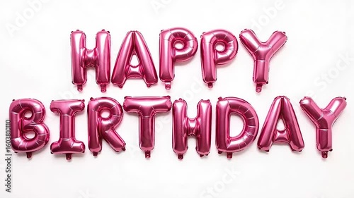 Pink Happy Birthday balloons float, celebrating a special occasion with joy and festive cheer