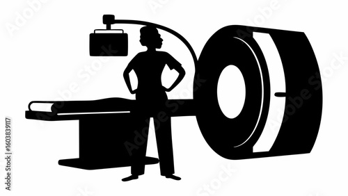 Silhouette of a medical professional standing next to a ct scanner and examination table in a hospital room