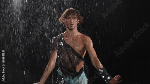 A truly captivating and mesmerizing dance performance featuring fluid, captivating movements and stunning water effects